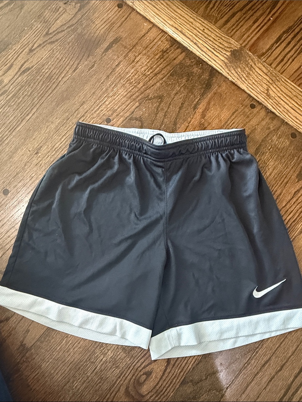 Nike Black Shorts with White Trim and Swoosh